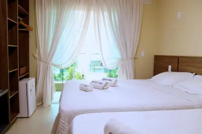 Uma cama ou camas num quarto em Star Hotel