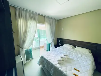 Uma cama ou camas num quarto em Star Hotel