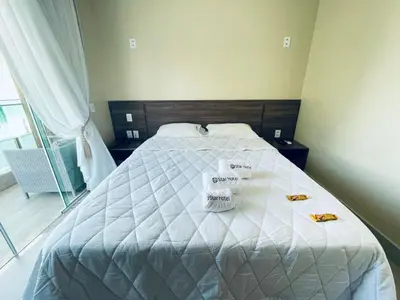 Uma cama ou camas num quarto em Star Hotel