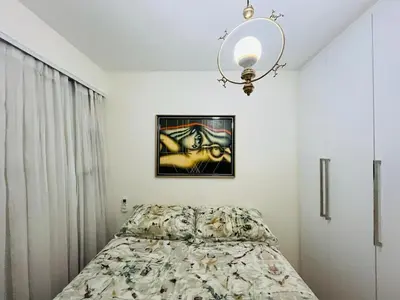 Uma cama ou camas num quarto em Cond. Beach Village Residence 1