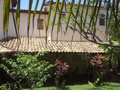 Um jardim no exterior de Pousada Agua Marinha