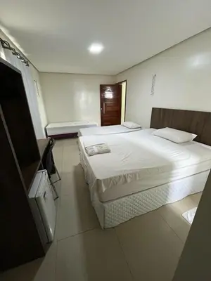 Uma cama ou camas num quarto em Seller Hotel