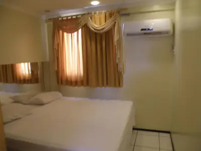 Uma cama ou camas num quarto em Porto de Iracema Apartment 2 Quartos/ 2 Bedrooms)