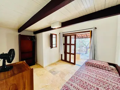 Uma cama ou camas num quarto em Pousada e Restaurante do Paulo