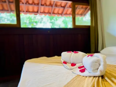 Uma cama ou camas num quarto em Pousada e Restaurante do Paulo