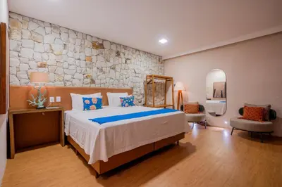 Uma cama ou camas num quarto em Dayo Hotel