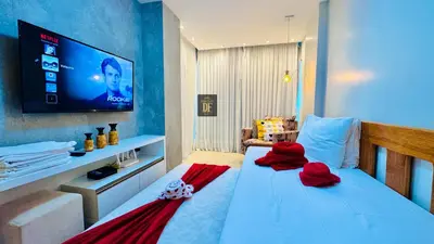 Uma cama ou camas num quarto em Vg Fun by Diego Flats