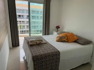 Uma cama ou camas num quarto em Apto. Solárium com vista Piscina Próx. Beach Park