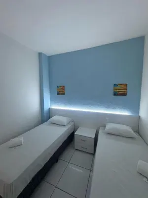 Uma cama ou camas num quarto em Hotel Americas