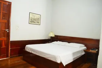 Uma cama ou camas num quarto em Hotel Americas