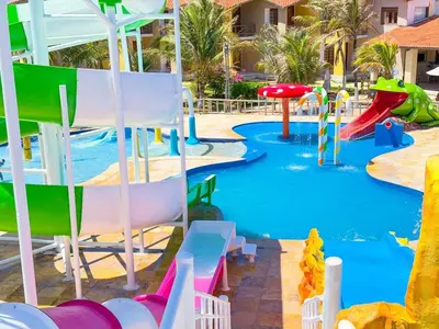A piscina em ou perto de Jangadeiro Praia Hotel Resort - Parque Aquático e Pé na Areia