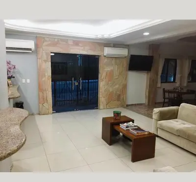 Uma área de estar em Ideal Praia Hotel