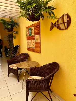 Uma área de estar em Maré Praia Hotel