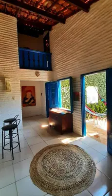 Uma área de estar em Casa Jasmine Taíba