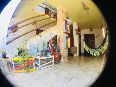 Um jardim no exterior de Pousada Sena