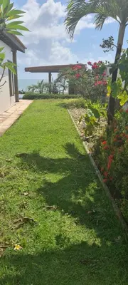 Um jardim no exterior de Villa 06 - Taiba Beach Resort - TBR