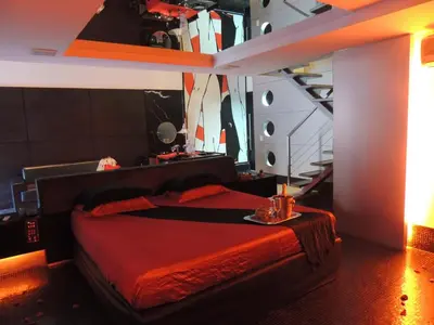Uma cama ou camas num quarto em Palace Fortaleza Centro de Eventos motel