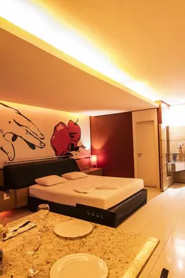 Uma cama ou camas num quarto em Palace Fortaleza Centro de Eventos motel