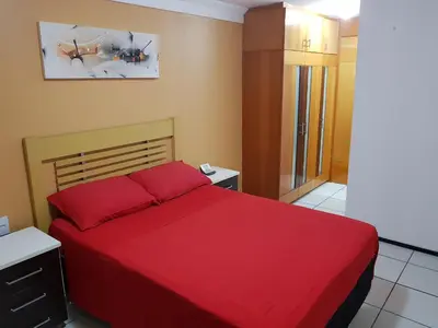 Uma cama ou camas num quarto em Apartamento Porto de Iracema estilo