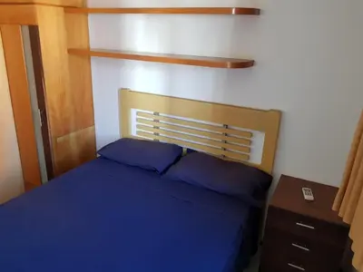 Uma cama ou camas num quarto em Apartamento Porto de Iracema estilo