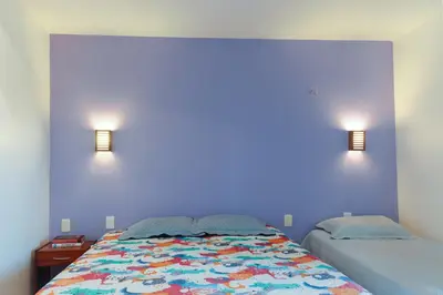 Uma cama ou camas num quarto em Apartamento no Taiba Beach Resort