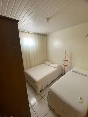 Uma cama ou camas num quarto em Residência Ximenes