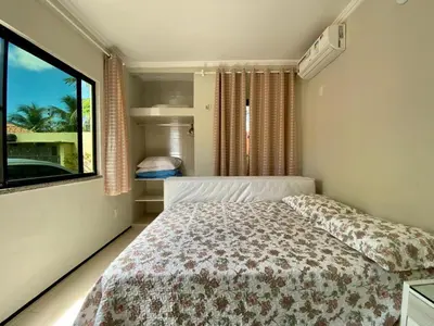 Uma cama ou camas num quarto em Flat Crystal Park Porto das Dunas