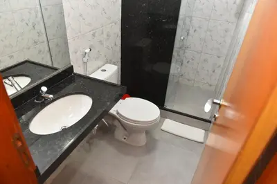 Uma casa de banho em Hotel Três Caravelas