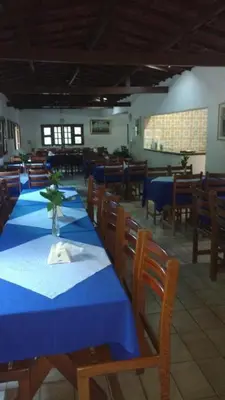 Um restaurante ou outro lugar para comer em Estancia Vale das Flores