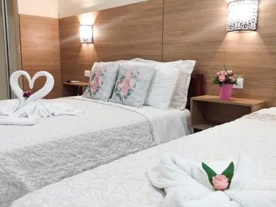 Uma cama ou camas num quarto em Planet Dunas Residence