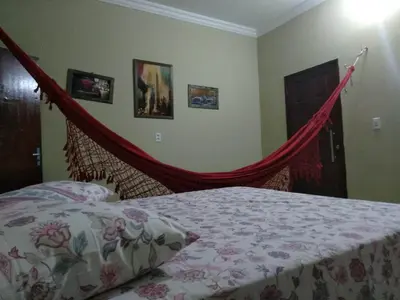 Uma cama ou camas num quarto em Chalés Porto do Céu