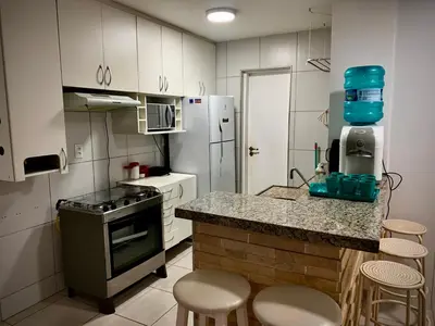 A cozinha ou kitchenette de Apto Aquaville Resort