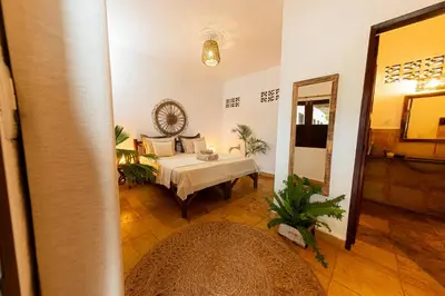 Uma cama ou camas num quarto em 7 Beaufort - Kitesurf Pousada