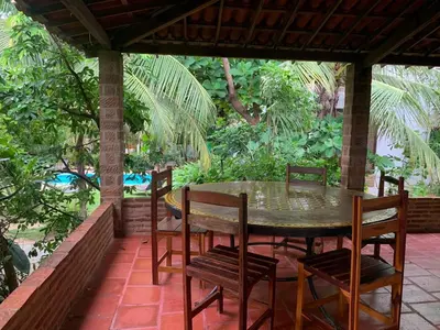 Um jardim no exterior de Pousada Morada do Sol