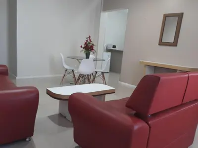 Uma área de estar em San Phillip Flat Hotel