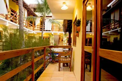 Um restaurante ou outro lugar para comer em Villa Água de Coco