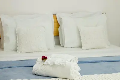 Uma cama ou camas num quarto em Villa Água de Coco
