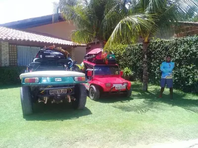 Um jardim no exterior de Pouso do Kite Pousada Flecheiras