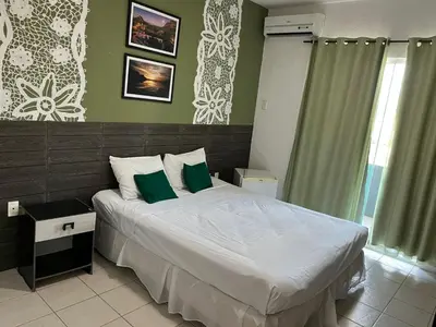 Uma cama ou camas num quarto em Hotel Belas Artes