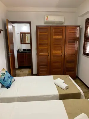 Uma cama ou camas num quarto em Royal Beach Cumbuco