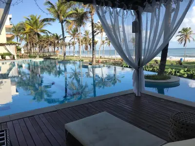 A piscina em ou perto de Condomínio Wai Wai Pé na Areia - Praia de Cumbuco