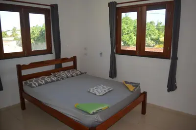 Uma cama ou camas num quarto em Casa do Sol