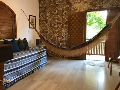 Uma cama ou camas num quarto em Apartamento no centro da vila de Jericoacoara