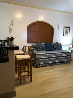 Uma área de estar em Apartamento no centro da vila de Jericoacoara