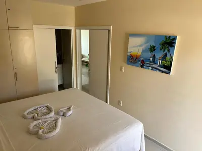 Uma cama ou camas num quarto em Vizinho dos Parapente - Novo Luxo apartamento