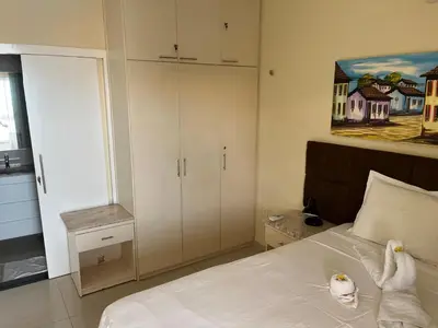 Uma cama ou camas num quarto em Vizinho dos Parapente - Novo Luxo apartamento