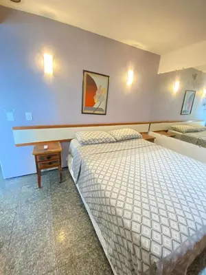 Uma cama ou camas num quarto em Avenida Beira Mar, The Best view!