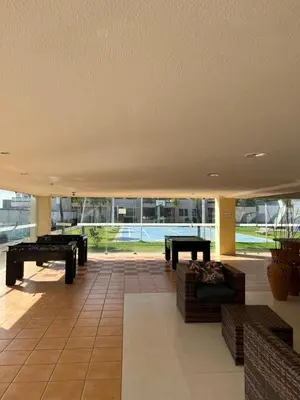 Uma área de estar em Marino Beach
