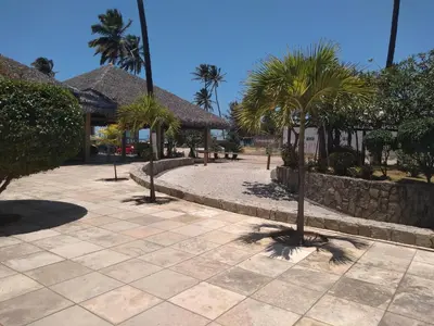 Um jardim no exterior de Eco Paradise ap 122