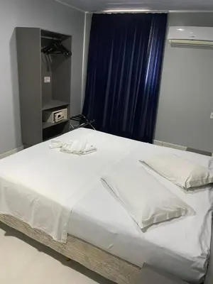 Uma cama ou camas num quarto em Hotel Aquarius